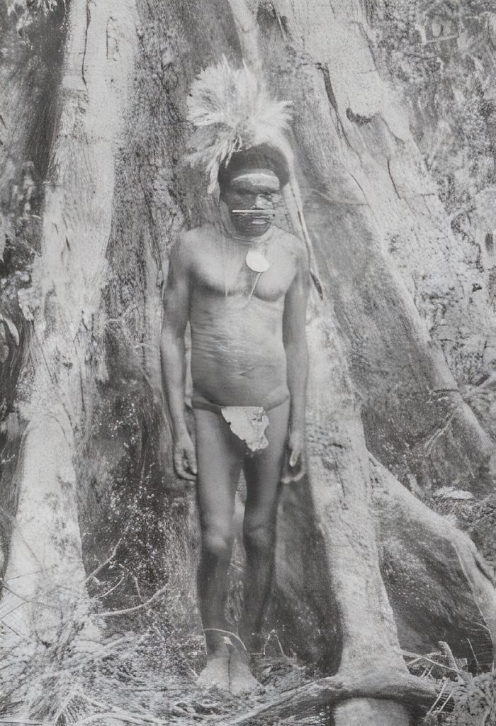 A man from Atherton in northern Queensland wearing a parrot feather headdress